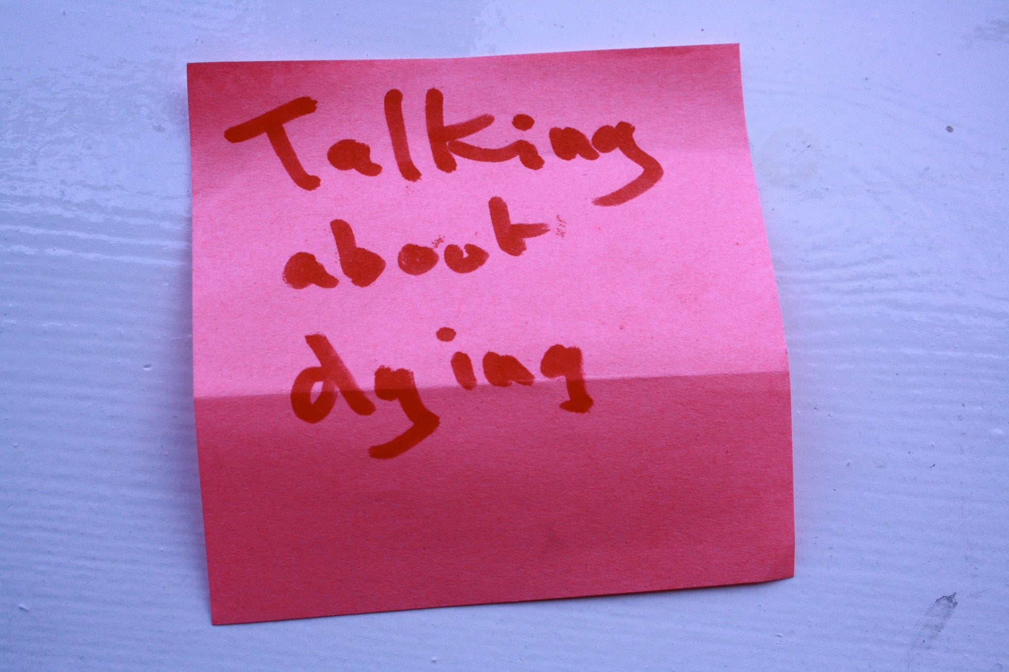 Post it with the words "Talking about dying"