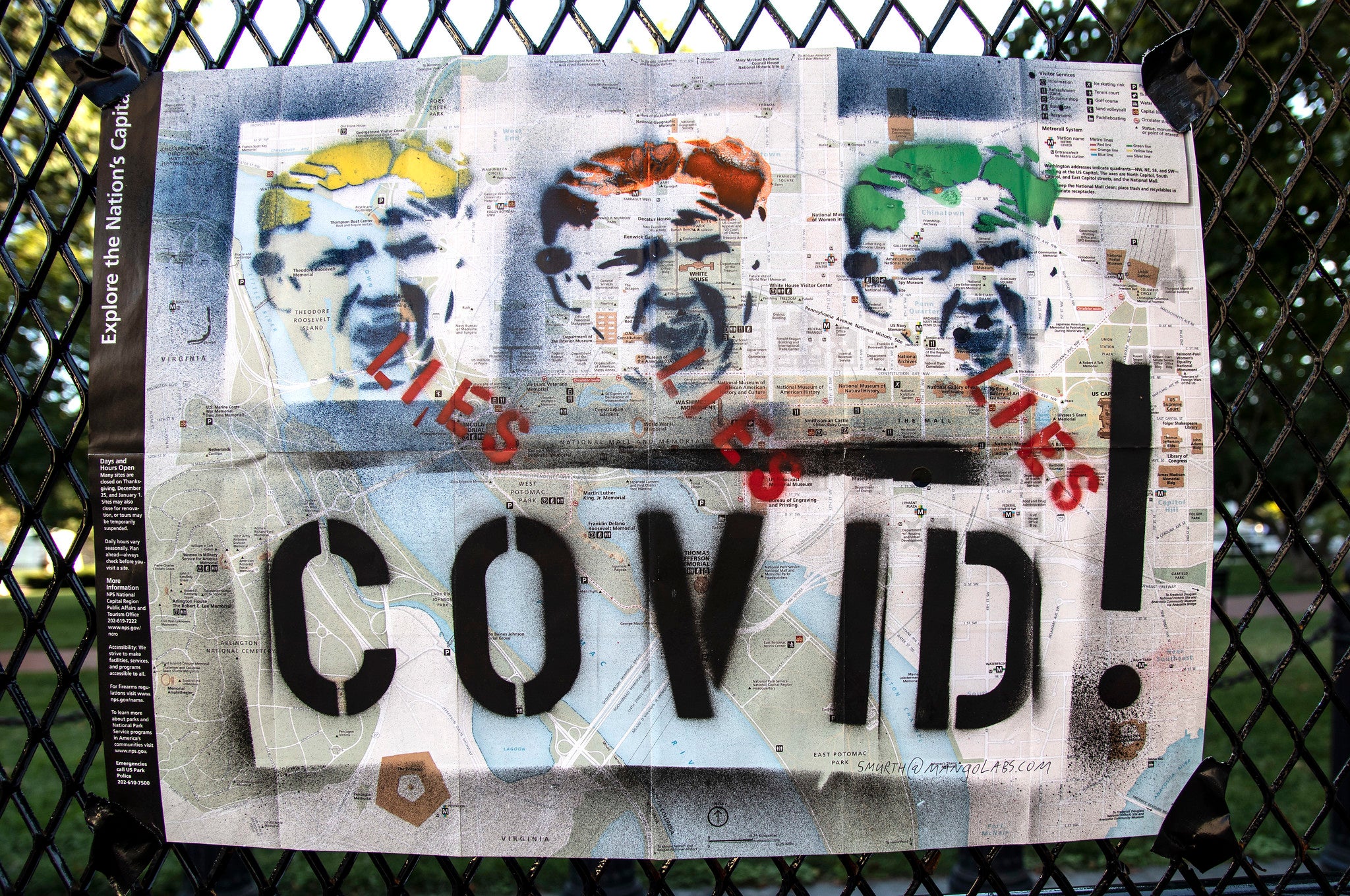 Graffitti covering map of Washington DC. The graffitti shows the icon of Donald Trump three times, the hair color of the first is yellow, of the second red, and the third green. Under each, the word "lies" is written. Underneath appears the word "Covid!"