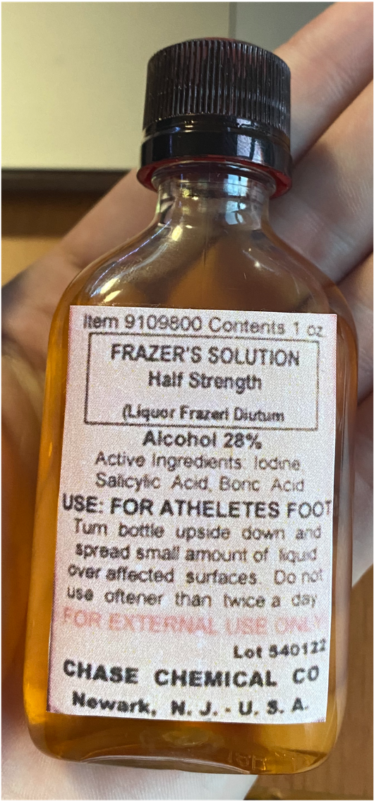 Recreation of a bottle with "Frazer's solution". The label includes directions of use, the name of the manufacturer and the place where it was produced