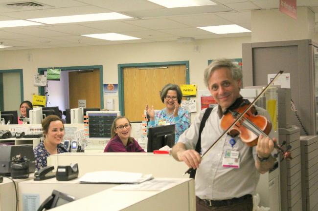 Anthony Hyatt plays violin at the Lombardi Cancer Center