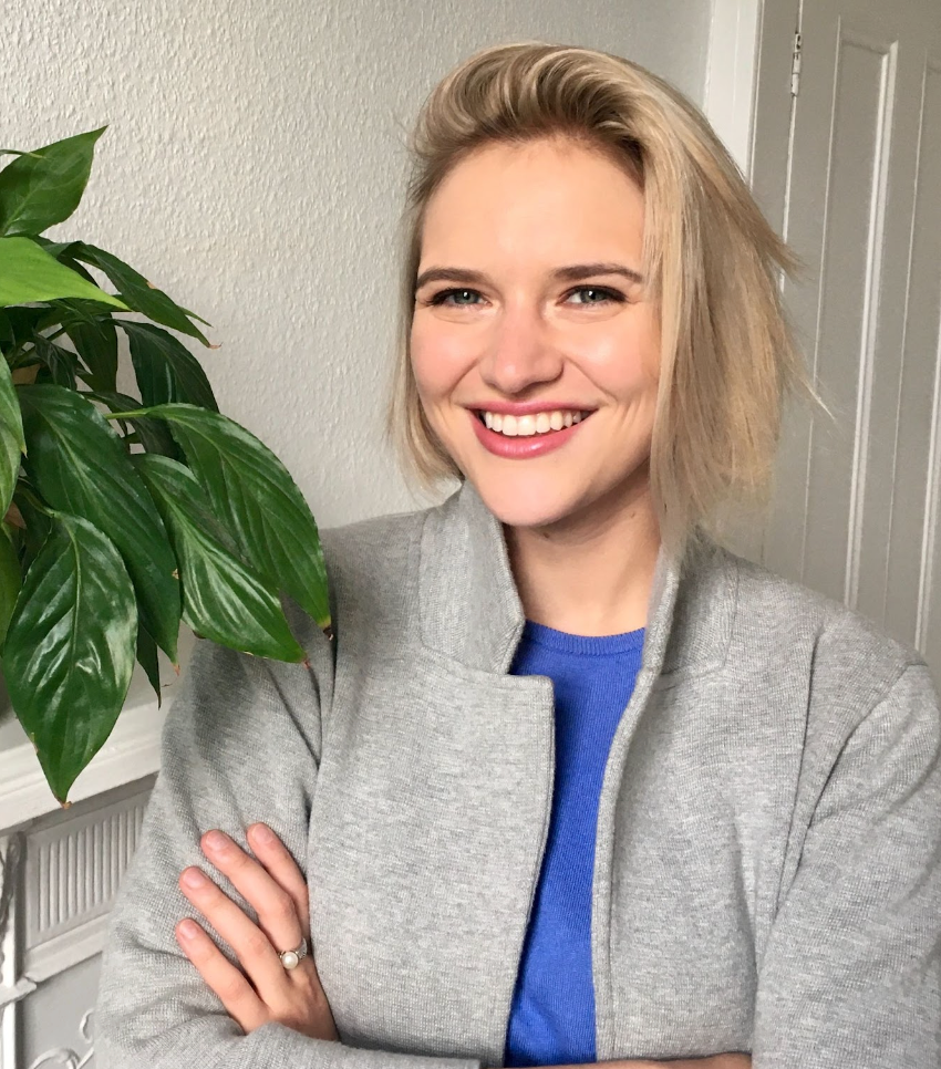 Dr. Christine Slobogin, a white woman with chin-length blond hair, smiling and wearing a gray blazer over a blue shirt.