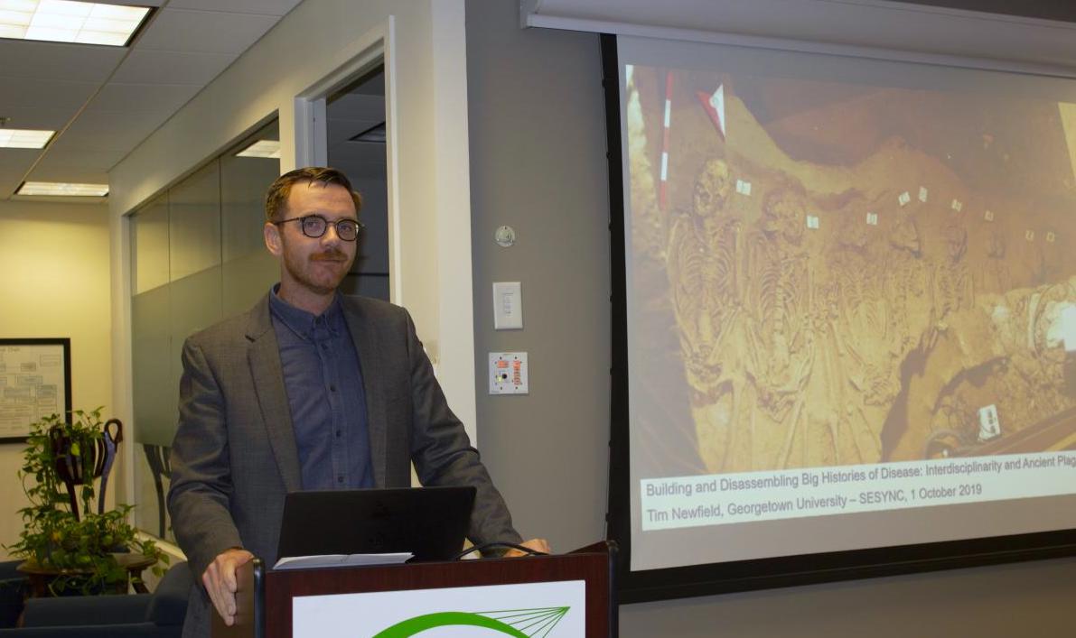 Timothy Newfield presenting his lecture titled 